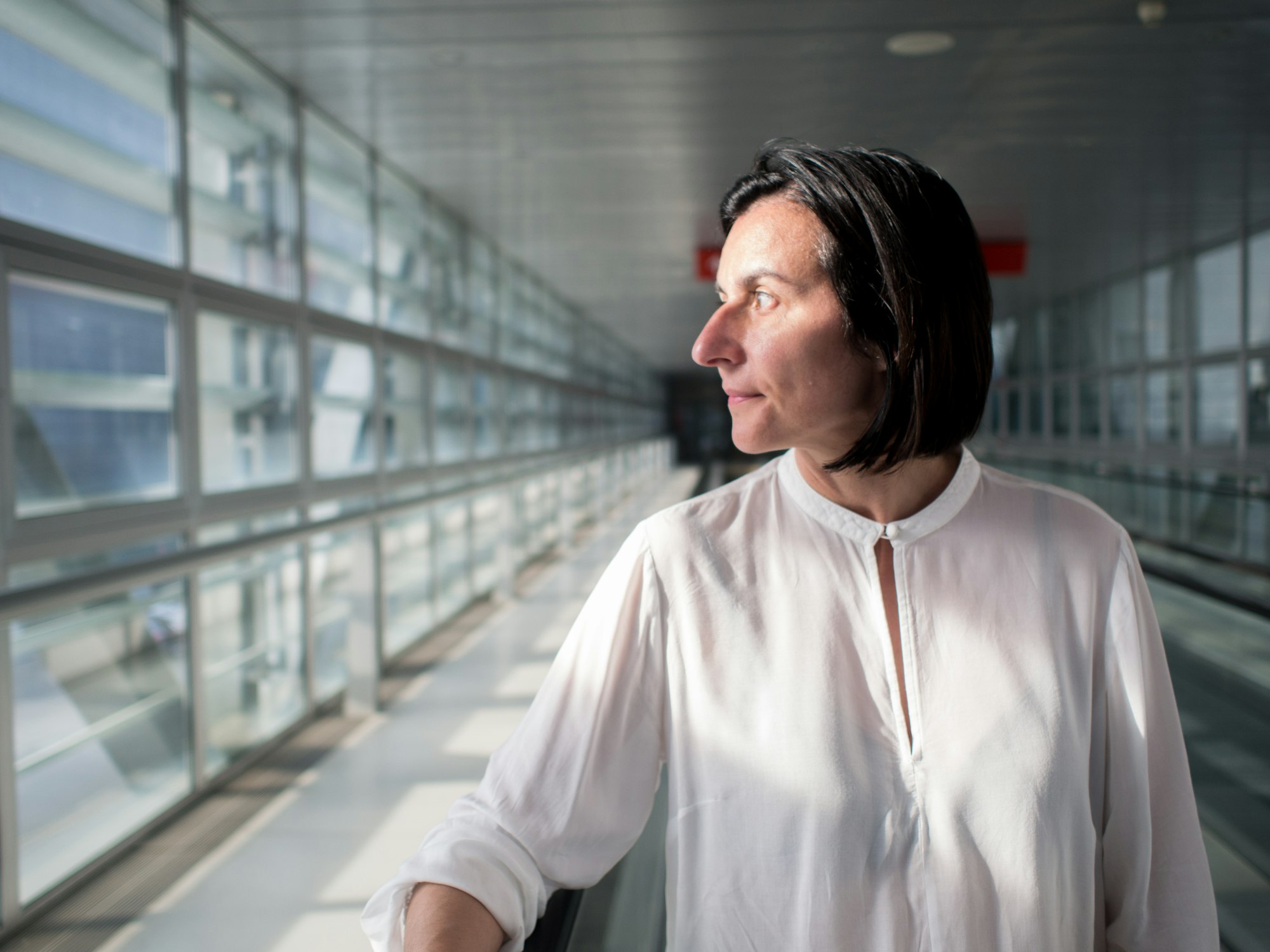 A woman on the treadmill at the airport